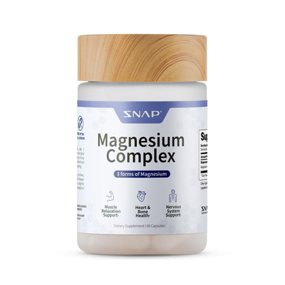 Supplement jar labeled 'Magnesium Complex' with a wooden cap on a white background