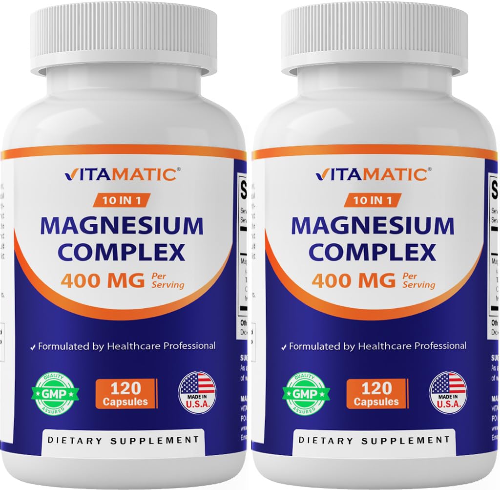 Two bottles of Vitamatic Magnesium Complex dietary supplements on a white background