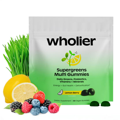 Wholier Supergreens Multi Gummies packaging with lemon, berries, and grass on a white background